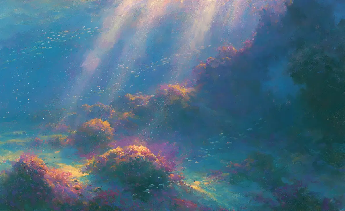 A wide underwater view of an ancient reef wall running across the middle distance, sunlight shafts angling down from the surface, small fish schooling in deep blue water